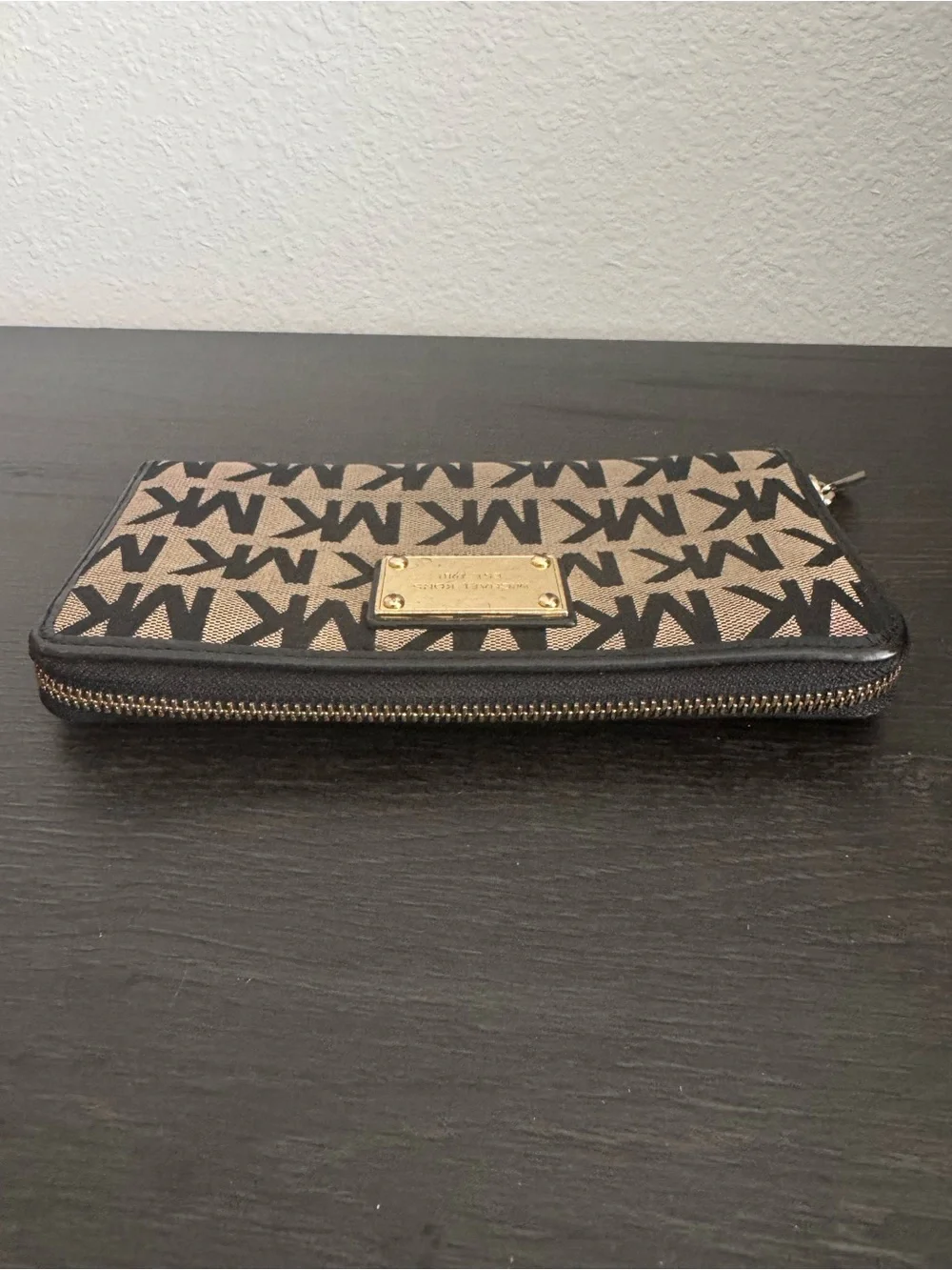 Michael Kors Monogram Zip Wallet in Tan and Black with Gold Plaqueu